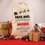 Saco de regalos de Navidad Personalizado con nombre. Con cordón ajustable. Diseño Papá Noel Renos